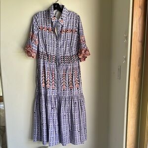 Elegant Patterned Dress with Orange Accents